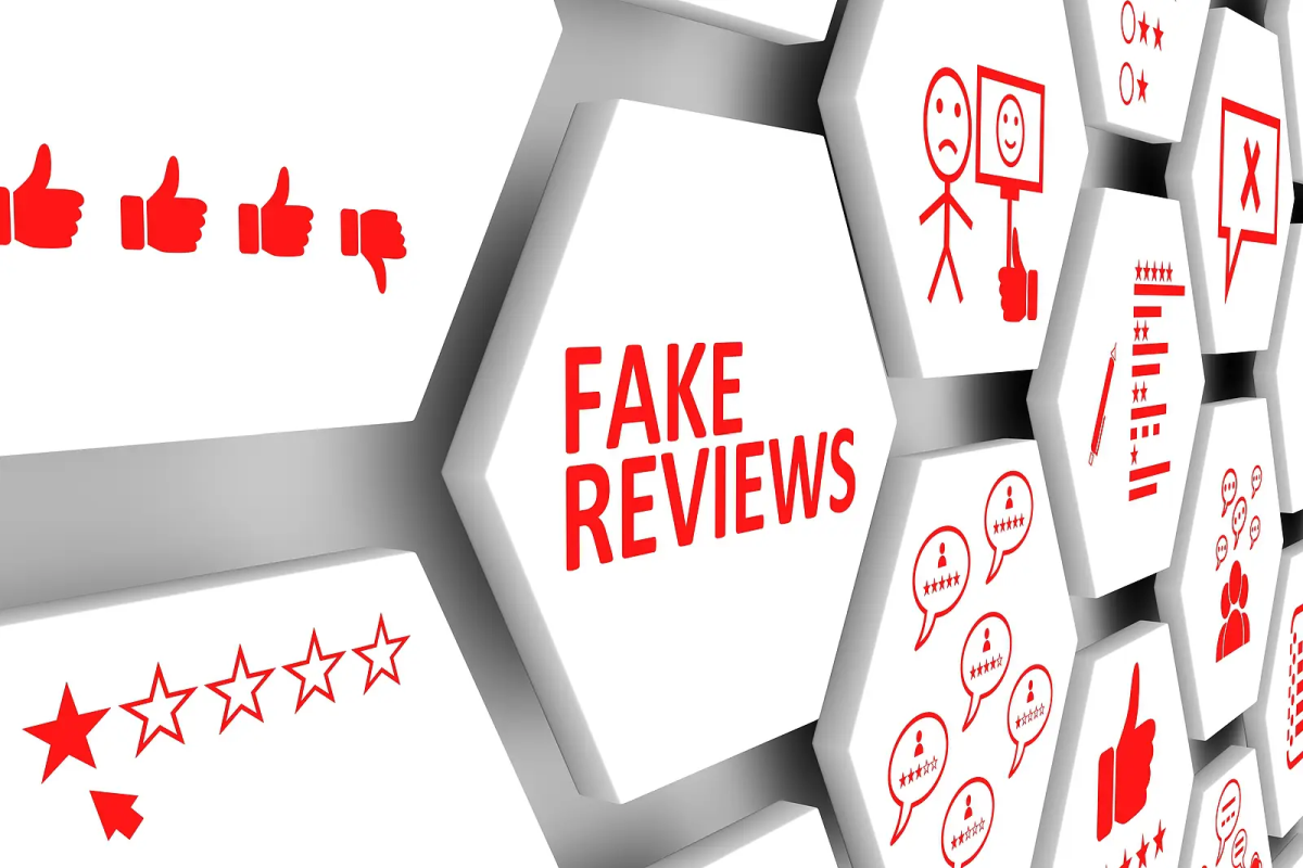 white and red graphic showing fake online reviews